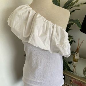 White Who What Wear off the shoulder top with ruffle trim. Size M.